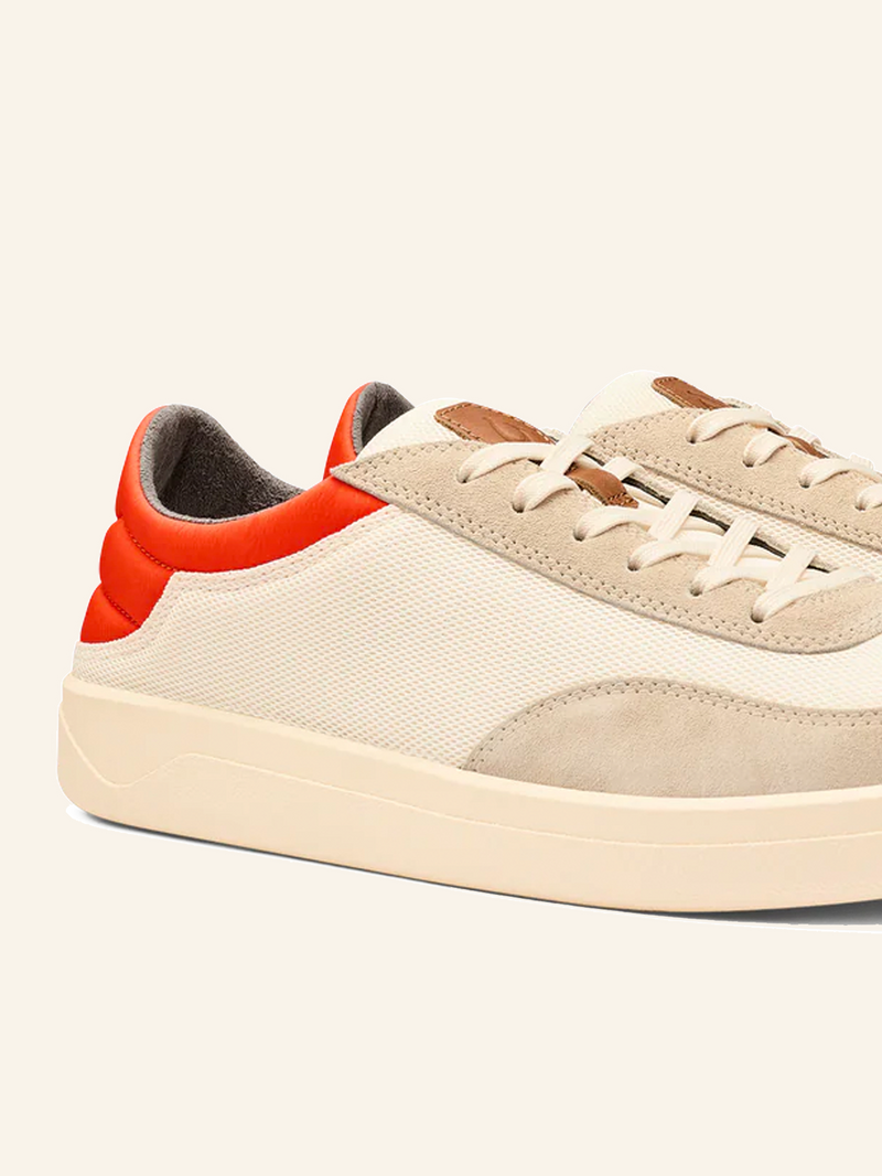 Pūnini Court Sneaker in Off White/Molten Orange