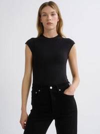 Front view of the AGOLDE Agata Bodysuit in Black, a cap sleeve bodysuit tucked into black jeans.