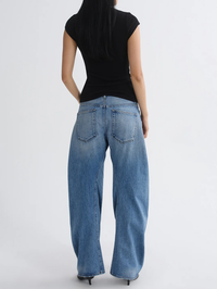Back view of the Spiral Jean in Venture by AGOLDE, featuring wide-leg silhouette and classic five-pocket denim
