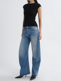 Front view of the Spiral Jean in Venture by AGOLDE, styled with a black cap-sleeve tee