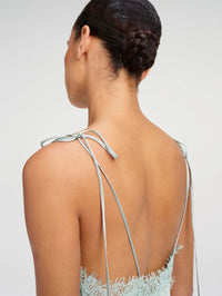 Back detail of the tie straps and lace edge on the A.L.C. Aleena Dress in Pale Jade