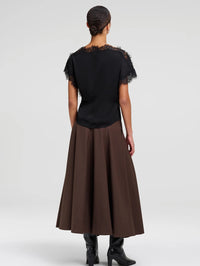 Back view of the A.L.C. Luna Top in Black showing the lace-trimmed shoulders and curved hem