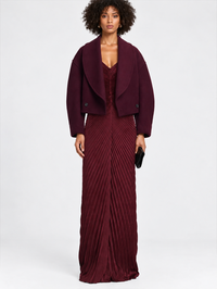 Front view of the Stella Jacket in deep mulberry by A.L.C., styled with pleated gown