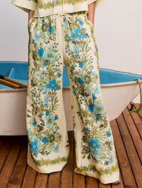 Front view of the Sophia Pant in Multi Soph by ALEMAIS, featuring blue floral botanical print on cream