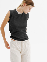 Front view of the Iris Gauze Tank in black by All Three, styled with cream drawstring pants
