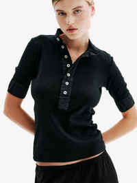 Front view of the Maria Rib Henley Shirt in black by ALL THREE with mother-of-pearl button placket