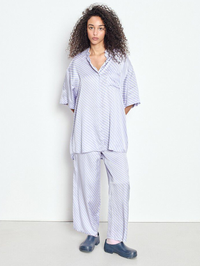 Full-length front view of the Bovalow Pant in Apolline by American Vintage, styled with matching striped pajama top