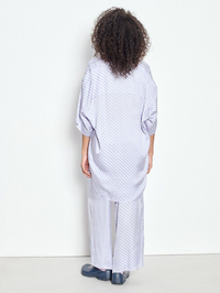 Back view of the Bovalow Pant in Apolline by American Vintage, styled with matching striped shirt