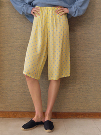 Front view of the Bovalow Pant in Marthe by American Vintage, featuring blue polka dots on yellow