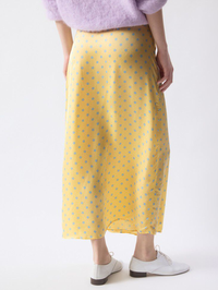 Back view of the Bovalow Skirt in Marthe with blue polka dots by American Vintage