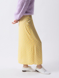 Side view of the Bovalow Skirt in Marthe yellow polka dot print by American Vintage
