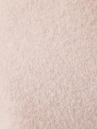 Close up of the fluffy compact knit on the American Vintage Damsville joggers in Melange Dust