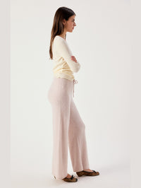 Side profile of the American Vintage Damsville knit joggers in Melange Dust