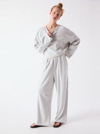 Full length view of the American Vintage Dantown Pant in Melange Sky Blue worn as a matching set