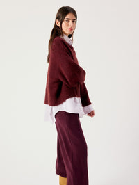 Side view of the American Vintage East oversized sweater in Melange Acerola