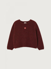 Flat lay of the American Vintage East sweater in Melange Acerola