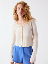 Front view of the Epaky Cardigan in Ecru by American Vintage, styled with blue shorts