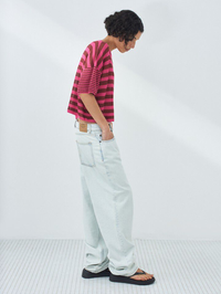Side view of the Epaky Tee in Lie De Vin Raye Fuchsia striped pattern by American Vintage