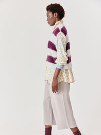 Side profile of the American Vintage Niby oversized vest in Cranberry Stripes