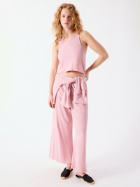 Full-length view of the Pojy Pant in Eglantine Vintage by American Vintage, styled as a set with matching tank top