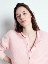 Model wearing the American Vintage Vitow cardigan in Melange Sugared Almond partly unbuttoned