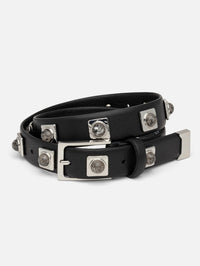 Coiled view of the Aureum No. 2 Belt in black leather with speckled stone studs in silver-tone settings.