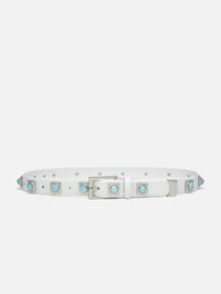 Flat lay of the NO. 2 Belt in chalk with turquoise stone studs and silver plating by AUREUM