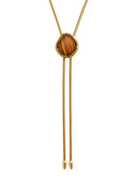 Close-up of the tigers eye centerpiece and lab diamonds on the BOLOLA NYC Lola Bolo in Gold.