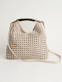 Bronx and Banco woven leather bag in White shown with its long shoulder strap and gold hardware.