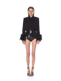 Full length front view of the Bronx and Banco black button down blouse with ostrich feather cuffs.