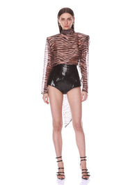 Full length front view of the Bronx and Banco brown zebra chiffon blouse with its long neck tie trailing.