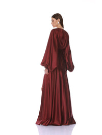 Back view of the Bronx and Banco Long Sleeve V-Neck Maxi Dress in burgundy showing the full sleeves.