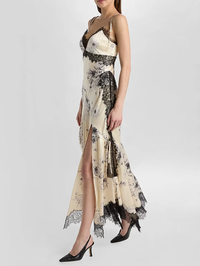 Side view of the Handsketched Floral Jett Dress in Gardenia and black by Cinq à Sept