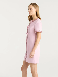 Side view of the Maelle Dress in Soft Peony by Cinq à Sept with ruffled lace trim