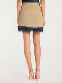 Back view of the Marie Skirt in khaki with navy feathered hem by Cinq à Sept