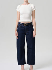 Full length view of the Citizens of Humanity Baby Waffle Tee in Pashmina styled with barrel jeans.