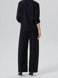 Back view of the Citizens of Humanity Brynn Drawstring Trouser in Navy showing the wide leg.