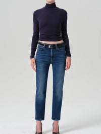 Full length view of the Citizens of Humanity Caradene Turtleneck in Navy styled with jeans.
