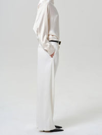Side view of the Citizens of Humanity Ines Trouser in Winter White showing the fluid drape.