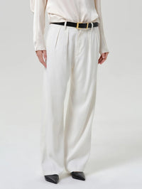 Front waist to shoe view of the Citizens of Humanity Ines Trouser in Winter White with front pleats.