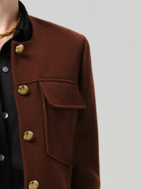 Close up of the flap pocket and gold buttons on the Citizens of Humanity Sophia Jacket in Brandy.