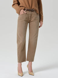 Front waist to shoe view of the Citizens of Humanity Winslow Cropped 27 Jean in Tan with a brown belt and pumps.