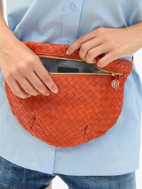 Close-up of the woven leather Grande Fanny in Saltillo by Clare V. with open zipper detail