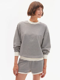 Front view of the Oversized Sweatshirt in black and cream stripes by Clare V.