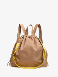 Front view of the Sac Tout Back Pack in latte with neon yellow zip details by Clare V.