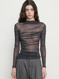 Close front view of the ruched bodice on the ENZA COSTA Plaid Mesh Long Sleeve Twist Top in Shadow Plaid.