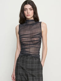 Close front view of the ruched bodice and high neck on the Enza Costa mesh twist top in Shadow Plaid.