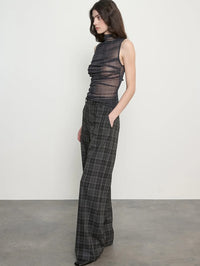 Side view of the Enza Costa Plaid Mesh Sleeveless Twist Top in Shadow Plaid showing the ruching.