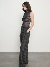 Side view of the Enza Costa Plaid Mesh Sleeveless Twist Top in Shadow Plaid showing the ruched bodice.