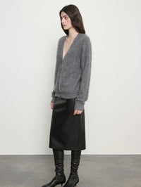 Side view of the Enza Costa Mink Wash Cashmere Cardigan in Pewter showing the V-neck and relaxed sleeves.